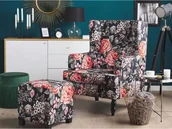 Fotele - Beliani Fotel z podnóżkiem w kwiaty czarny SANDSET - miniaturka - grafika 1