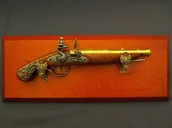 Repliki - broń - Denix SA REPLIKA BRYTYJSKI PISTOLET SKAŁKOWY NA TABLO MODEL 1196L+TM+23 1196L+TM+23 - miniaturka - grafika 1