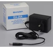 Dodatki do drukarek i skanerów - Sharp Sieciowy adapter EA28A 220V el.síť do zasilania kalkulatorów ANSHXXC14NXG - miniaturka - grafika 1