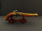 Repliki - broń - Denix SA REPLIKA WŁOSKI PISTOLET SKAŁKOWY NA STOJAKU MODEL 1104L+801 1104L+801 - miniaturka - grafika 1