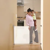 Zabezpieczenia dla dzieci - Dream Baby ROLL UP ZWIJANA BRAMKA 55/140 kolor biały - miniaturka - grafika 1