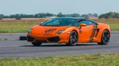 Vouchery - Jazda Lamborghini Gallardo i Ferrari F430 - kierowca - Tor Łódź - 2 okrążenia JLFKL - miniaturka - grafika 1