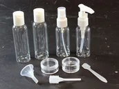 Kompasy - APTEL Zestaw pojemników na kosmetyki 9szt AG623 - miniaturka - grafika 1