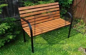 Ławki ogrodowe - Tradgard Drewniana ławka parkowa z żelazną ramą - miniaturka - grafika 1